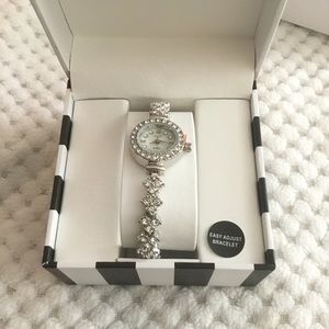 Quartz Movement Watch with Faux MOP Dial in SILVERTONE Adjustable Bracelet